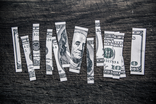 100 dollar bill ripped up