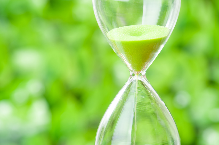 hourglass that has just been flipped to let sand fall through