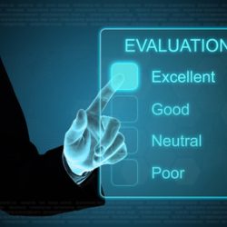 Image of a person pointing at a smart screen that says "Evaluation: Excellent, Good, Neutral, Poor"