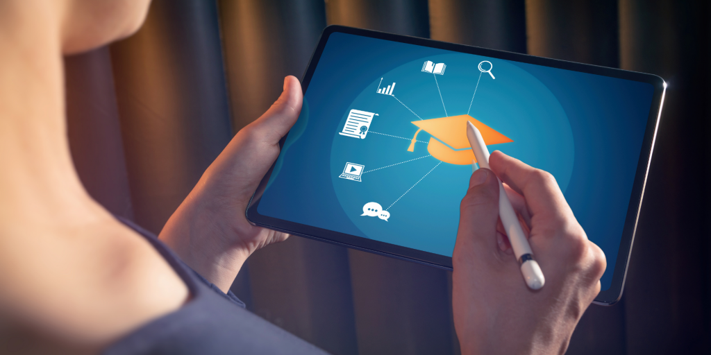 Woman on using digital pen on her tablet 