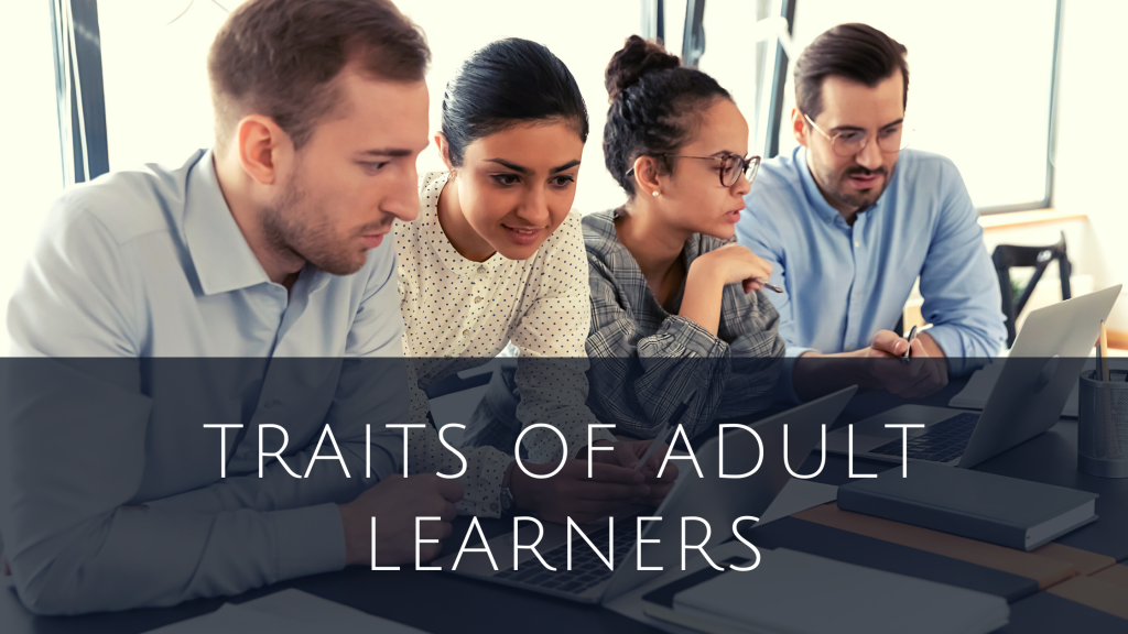 Adult learners working together on laptop